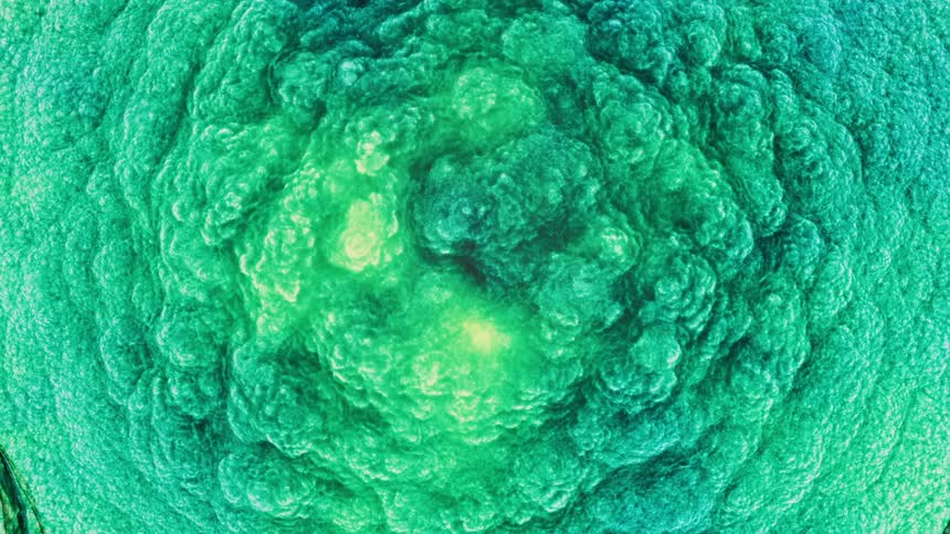 A cloud of green expands and morphs in a circle of waves