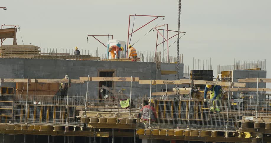Construction workers work on site