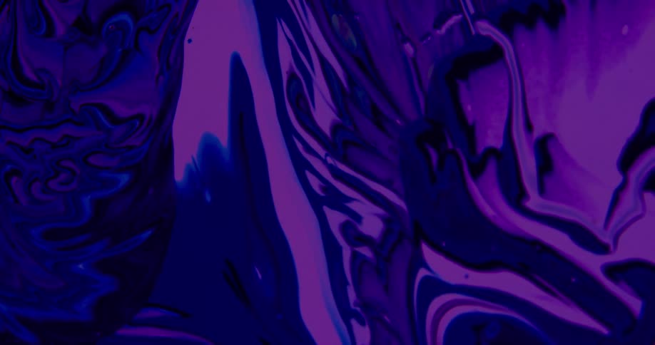 Close view of an abstract painting with swirls of blue pink and purple in a shadowy room