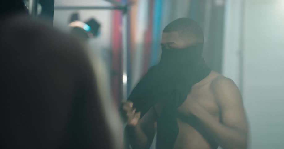 A man dresses in the studio