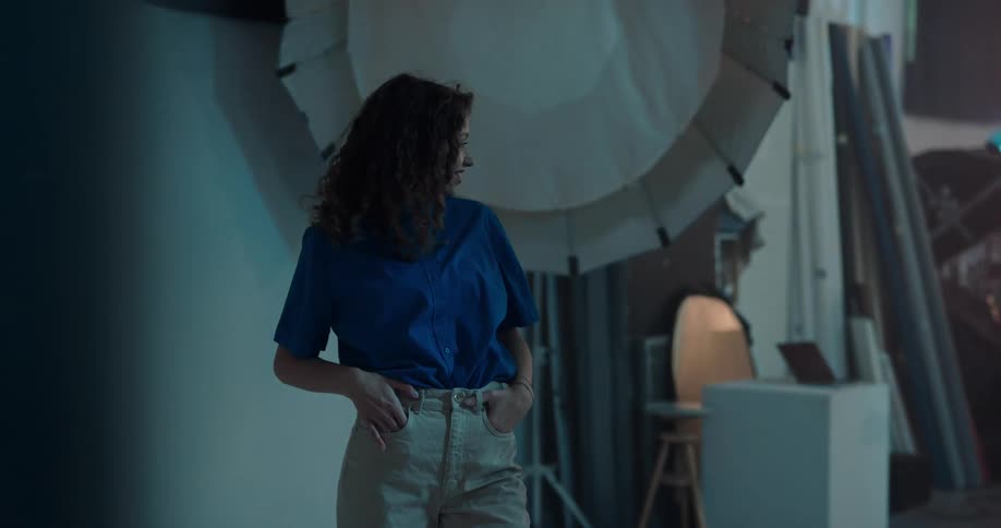 A woman is modeling for a photo shoot