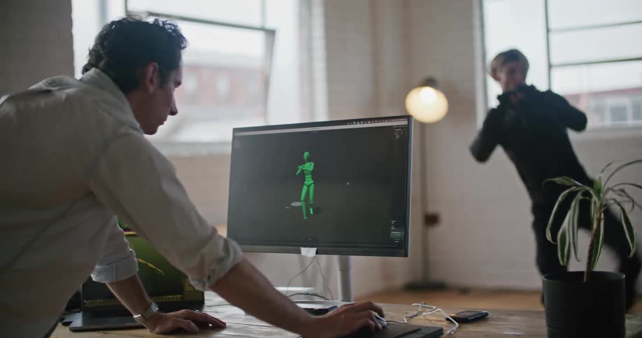 A man is being filmed kicking and jumping