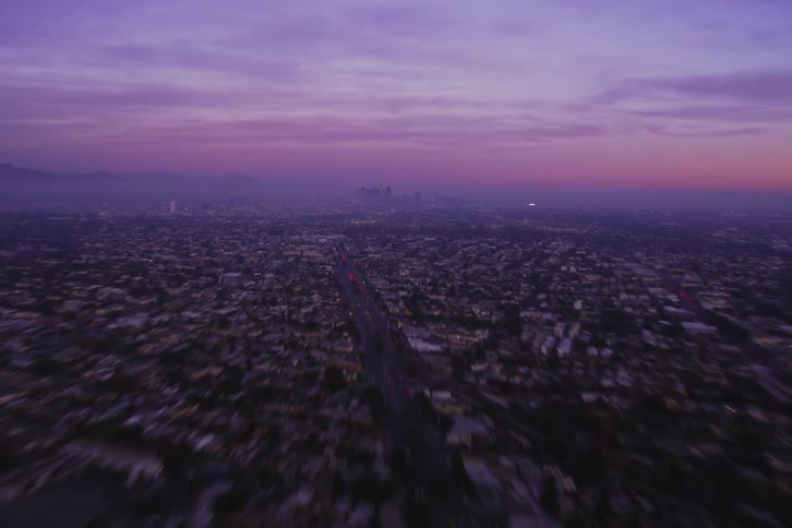The sky over a metropolis at sunset