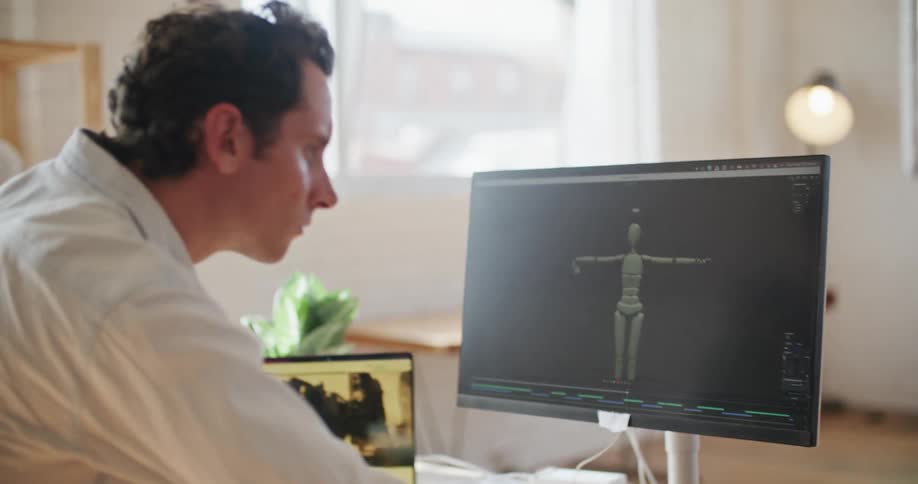 A man is using software on his computer