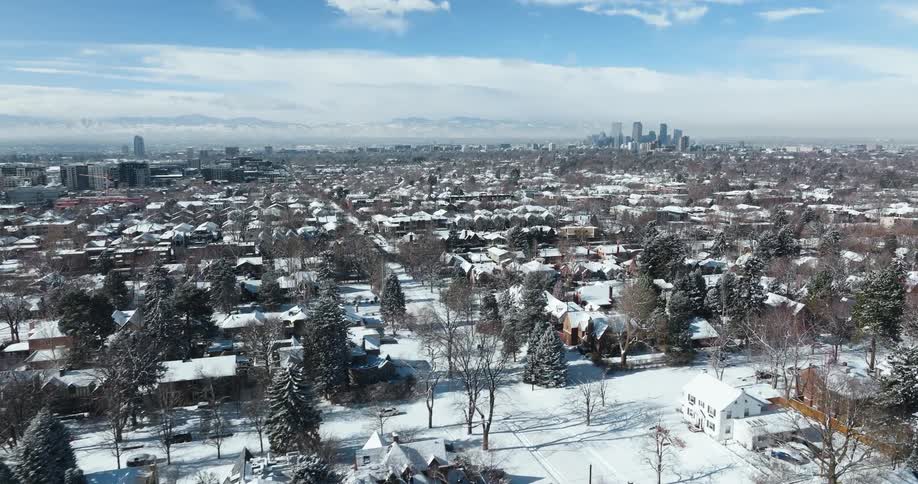 Aerial view of houses in a neighborhood during winter