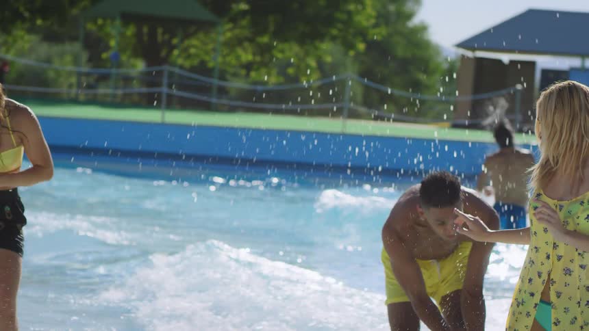 People splash and have fun in the pool