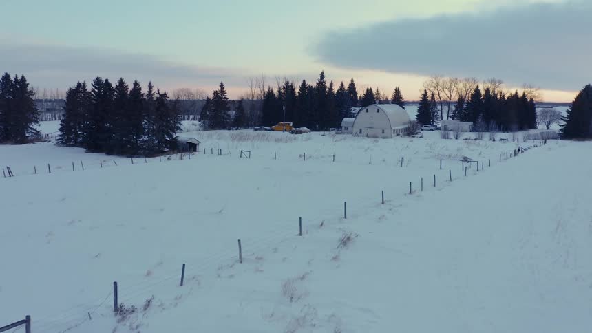 The farm is covered in snow