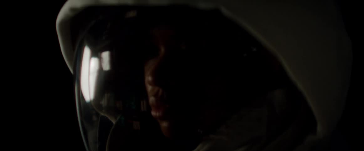 Black woman wearing a spacesuit