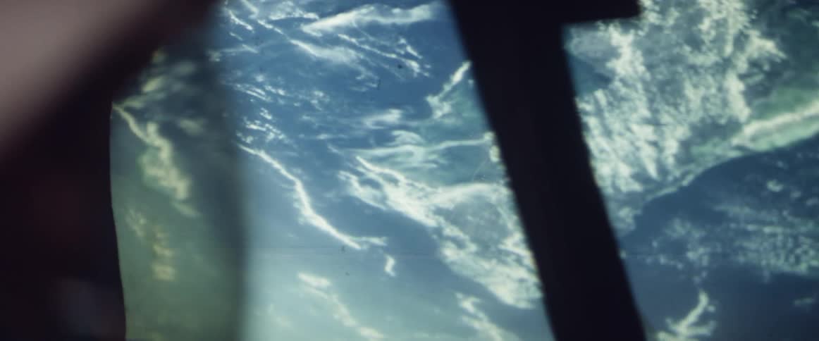 A window looking at mountains