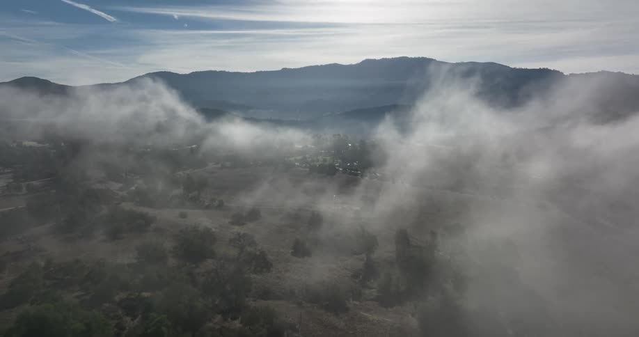Thick clouds block the mountain range