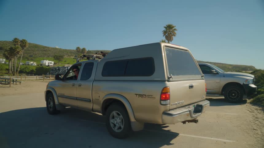 A person backing up a truck