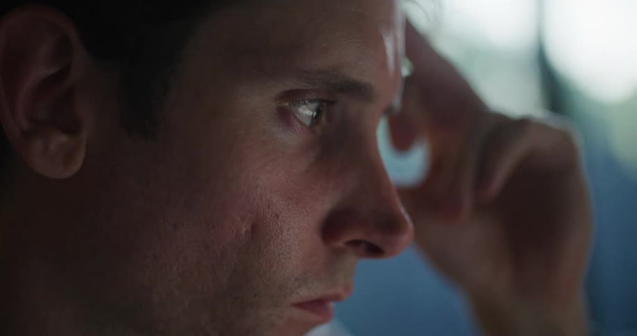 A man is looking at something