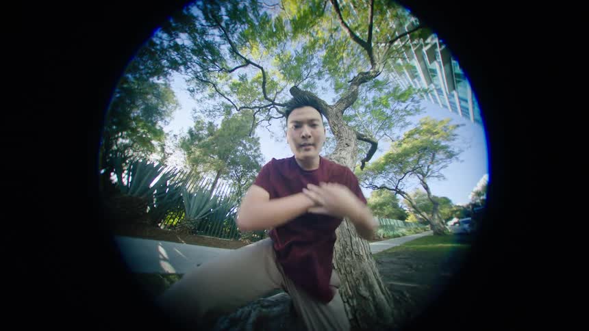 A man dancing outdoors