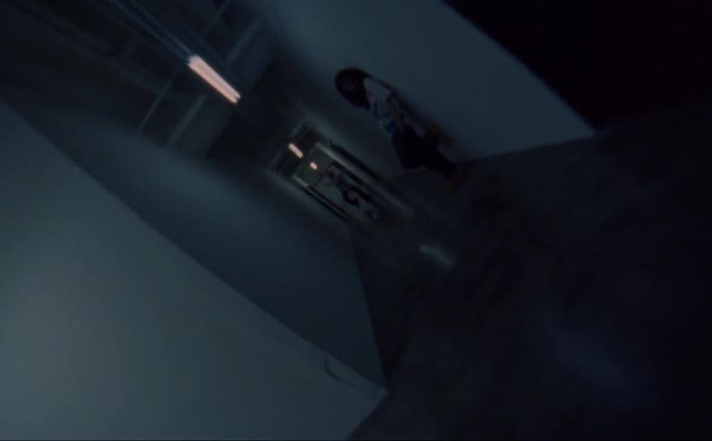 People are leaning on the walls in the hallway