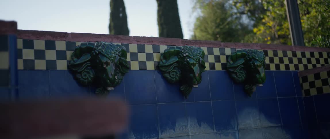Sculptures of ram's heads mounted on the Parc Montjuic fountains in Barcelona Spain