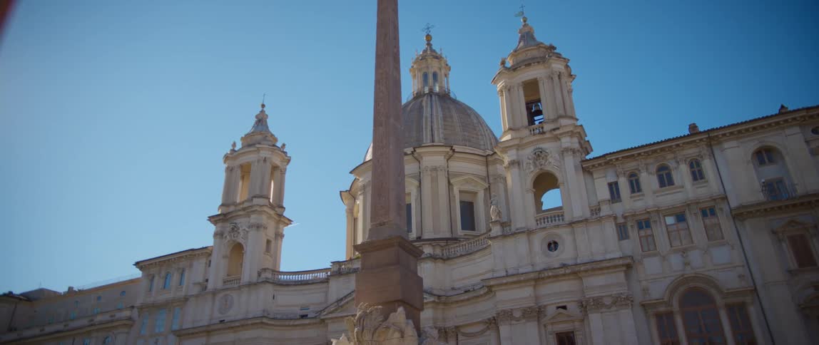 The building is stone with towers around