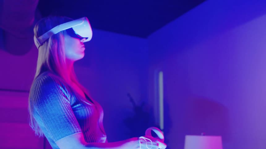 A woman using a virtual reality headset