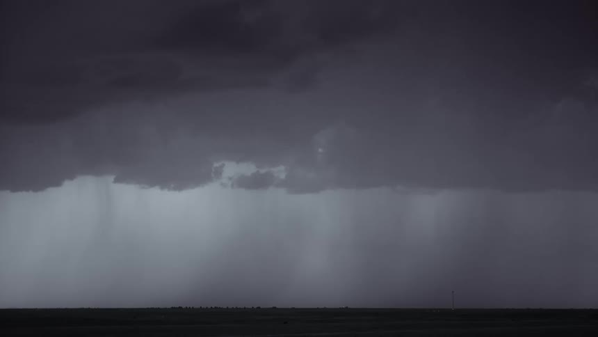 Lightning flashes in the storm clouds