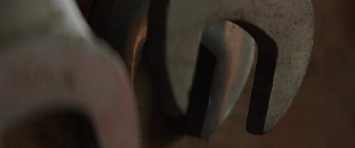 Light passes over metal wrenches