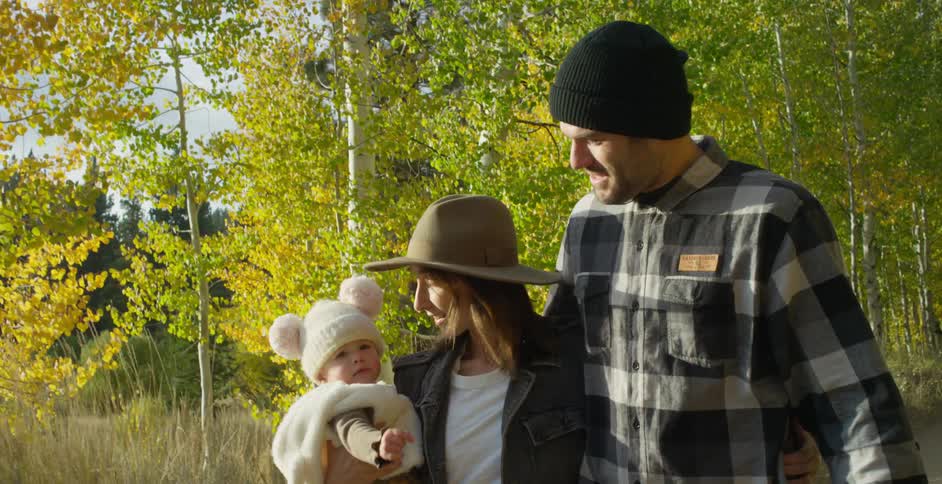 A family is hiking outdoors together in spring