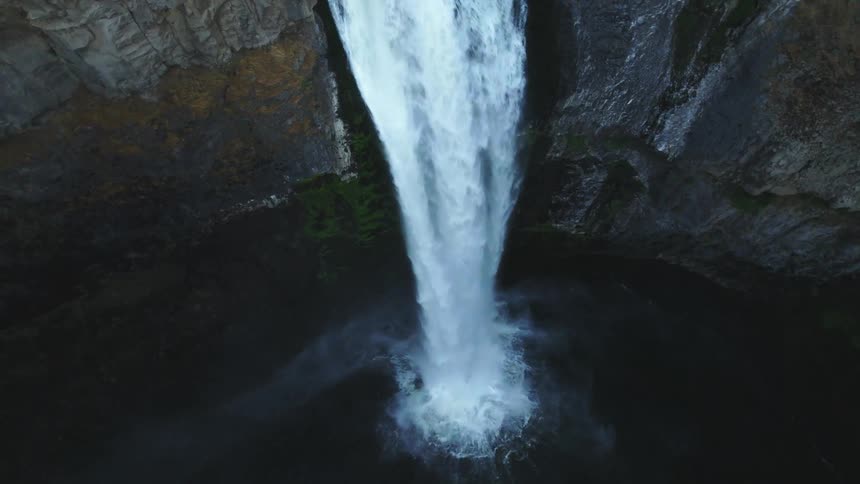 Waterfall cascades down cliffside