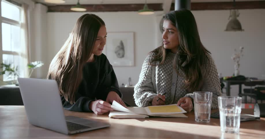 Two people are working on a project together