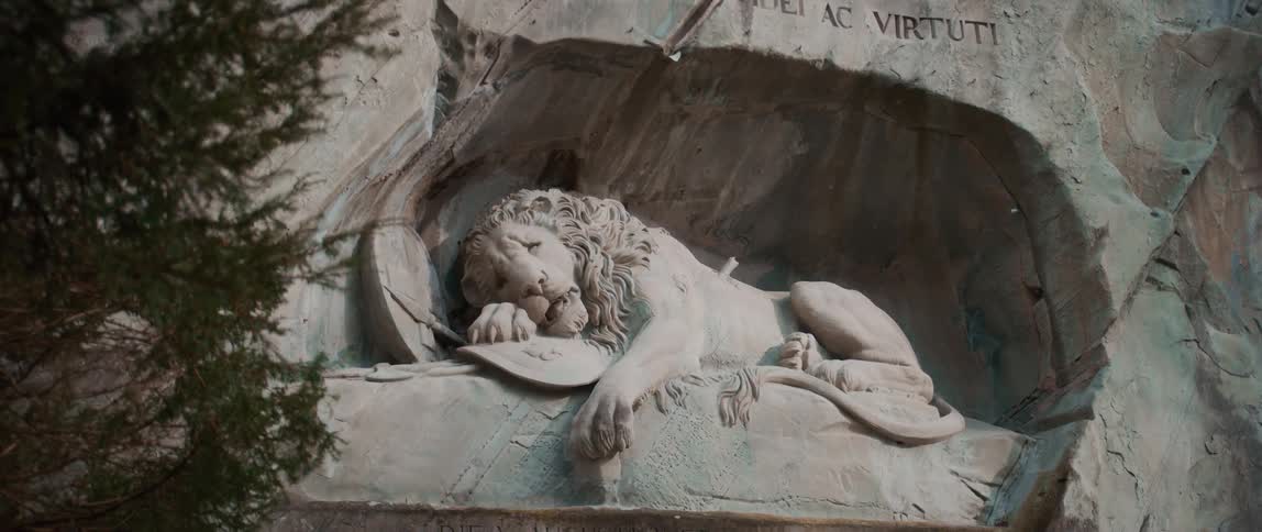 Large marble lying lion statue