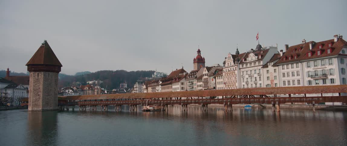 Houses are built near the coast of a body of water