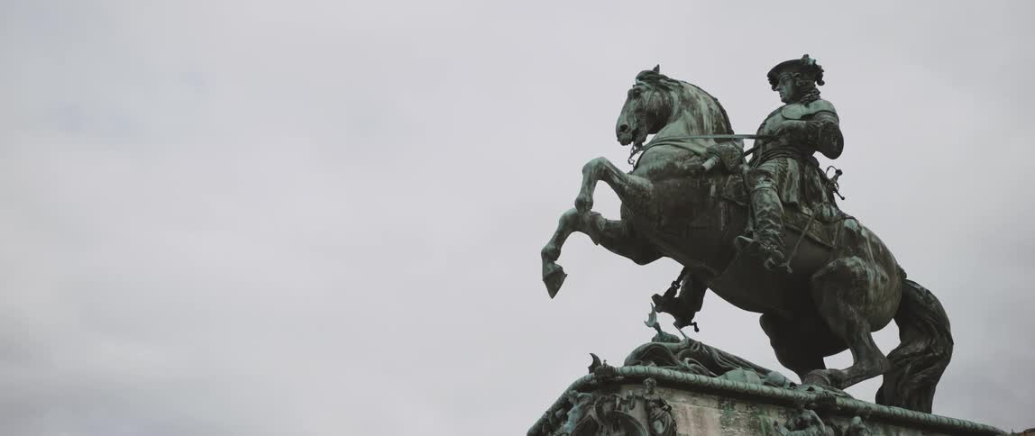 The bronze statue of prince eugene of savoy in vienna under a cloudy sky