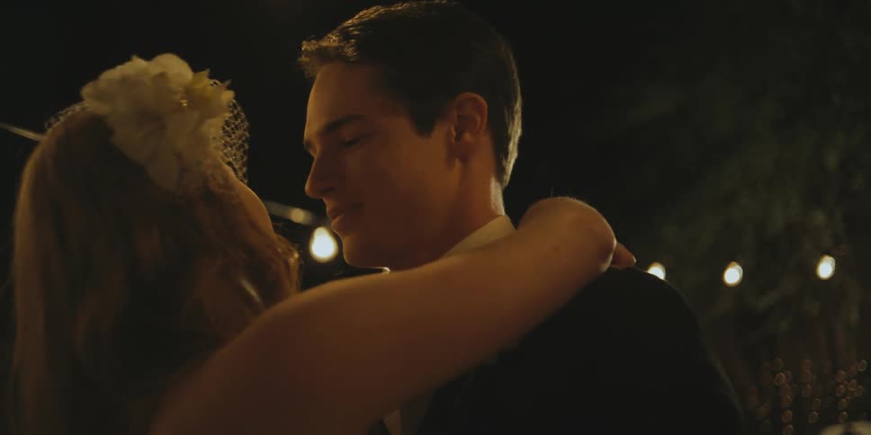 A bride and groom dance at their reception