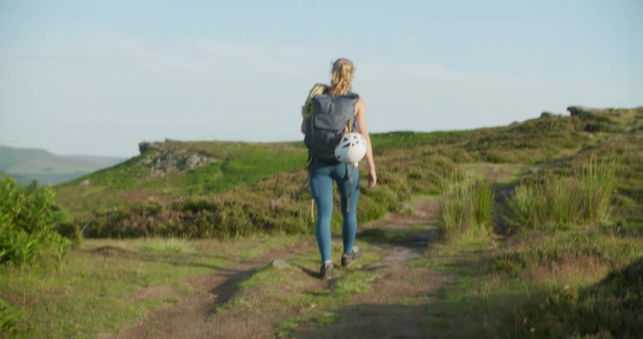 A female climber is going climbing