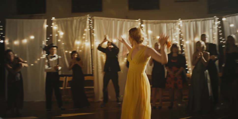 People dance and celebrate on the dance floor