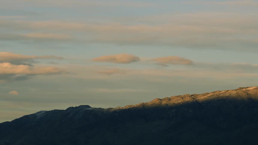 The shadow moves over the mountain
