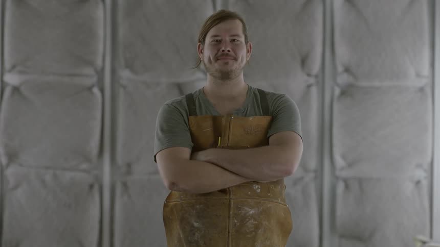 Man standing still and smiling