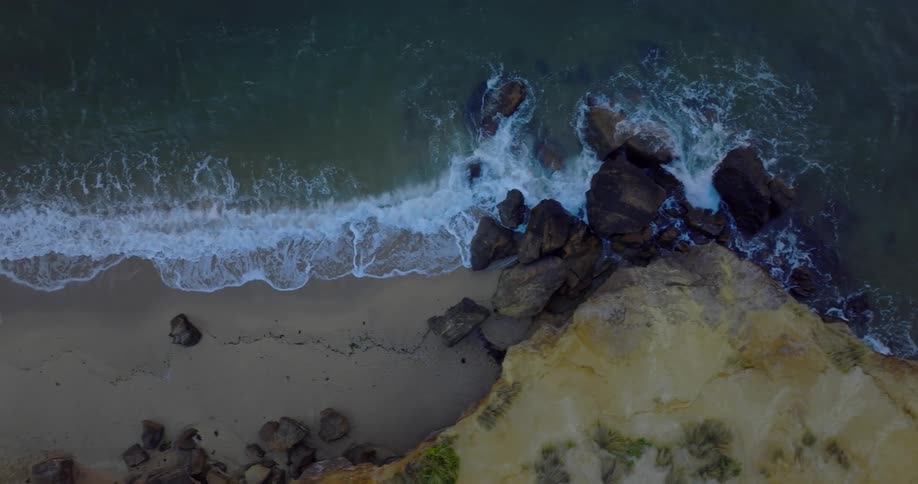 Ocean waves crash onto the beach