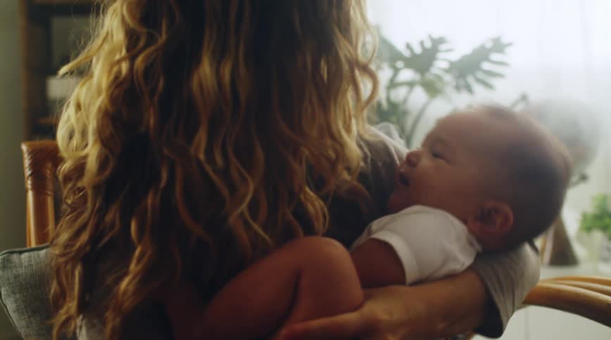 A mother playing with her son