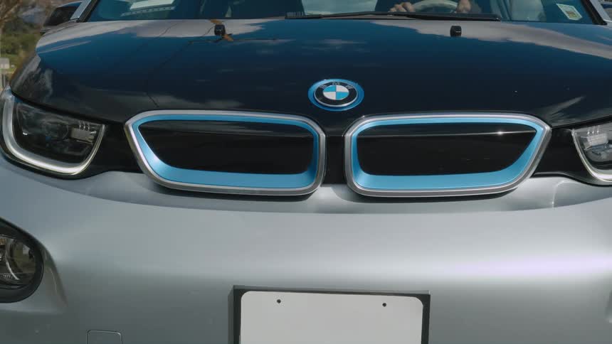 A view of a car driving outdoors