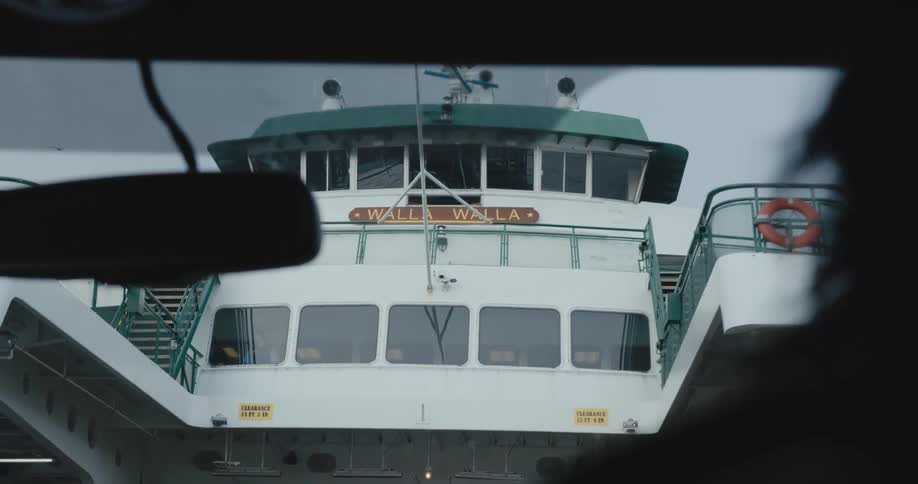 A car travels onto the walla walla ferry boat
