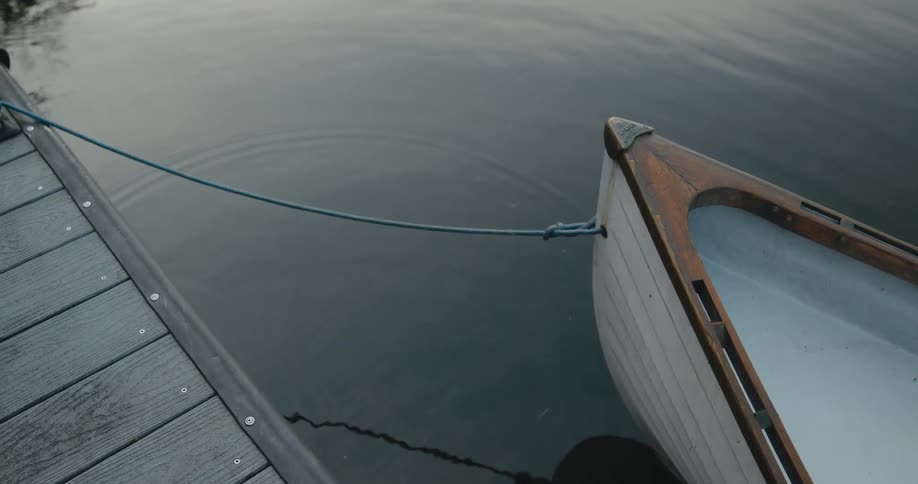 A view of a boat tied to a dock