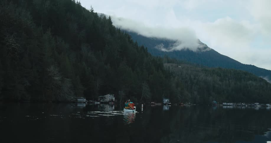 A view of a canoe out on a lake