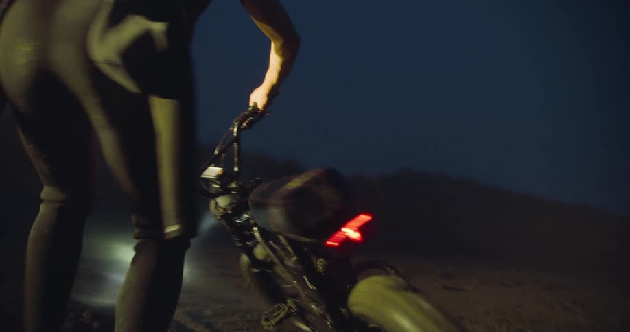 A man is doing doughnuts on his electric bike