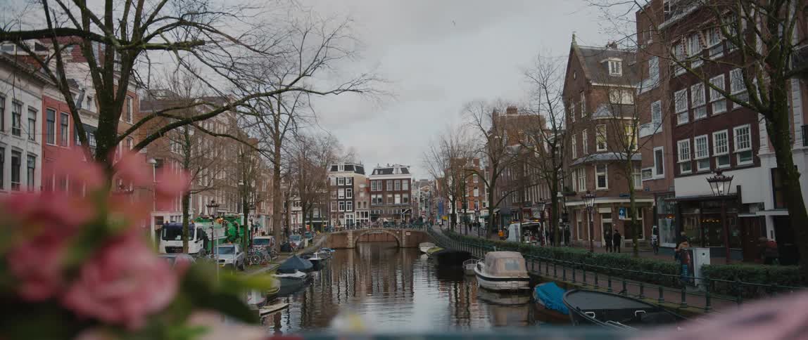 Charming canal view in Amsterdam on a cloudy day