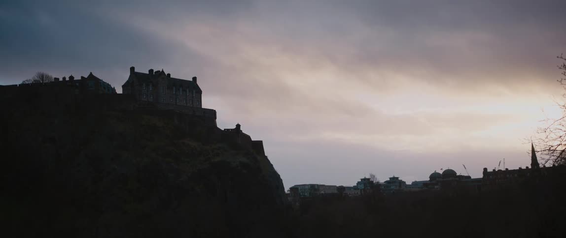 Edinburgh Castle silhouetted against the sky at sunset in Scotland, United Kingdom