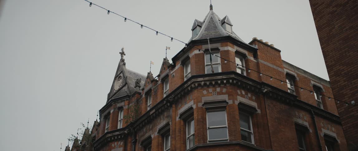 An old brick building on an overcast day