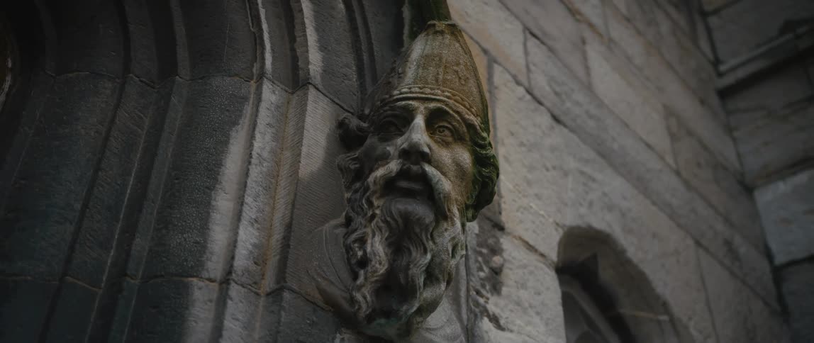 A carved sculpture of St. Patrick's head on The Chapel Royal in Dublin Castle, Ireland