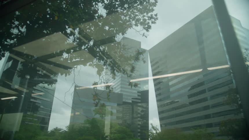 High rise office buildings in a city as seen from another building