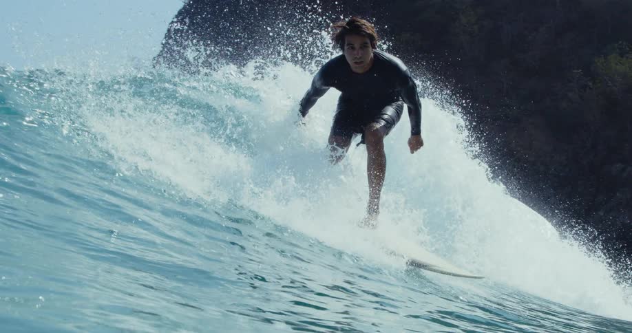 A man surfing outdoors