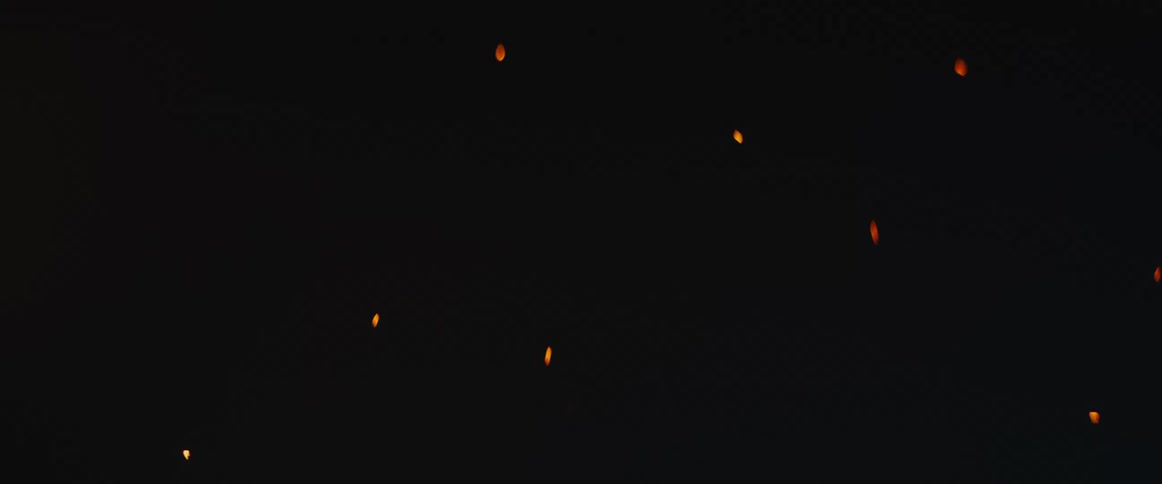 Fire burst upward then fades as sparks flow around