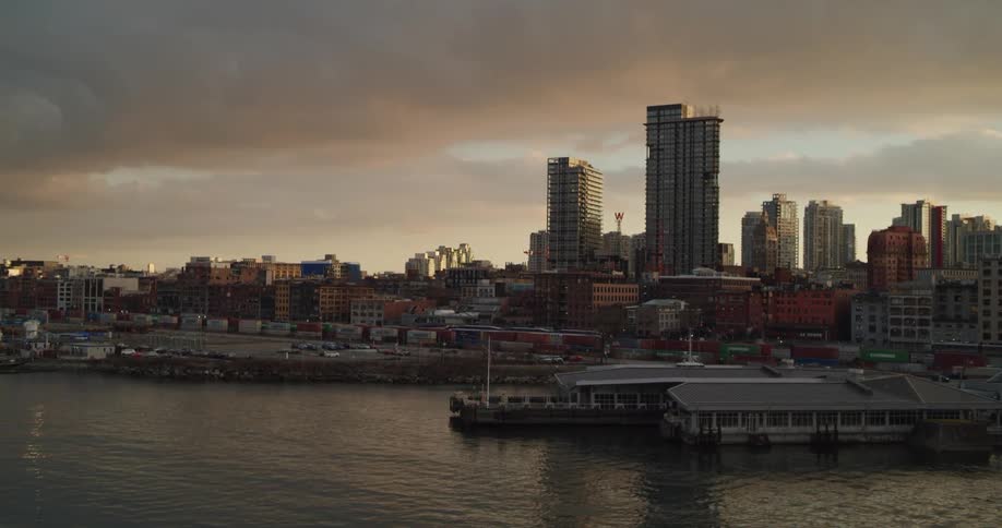 Vancouver waterfront and gastown during a stormy sunset