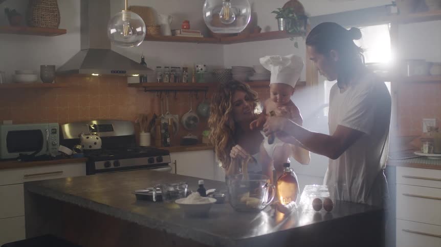 A family are cooking at home